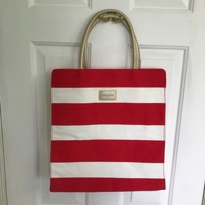 Red and white striped Lancôme bag